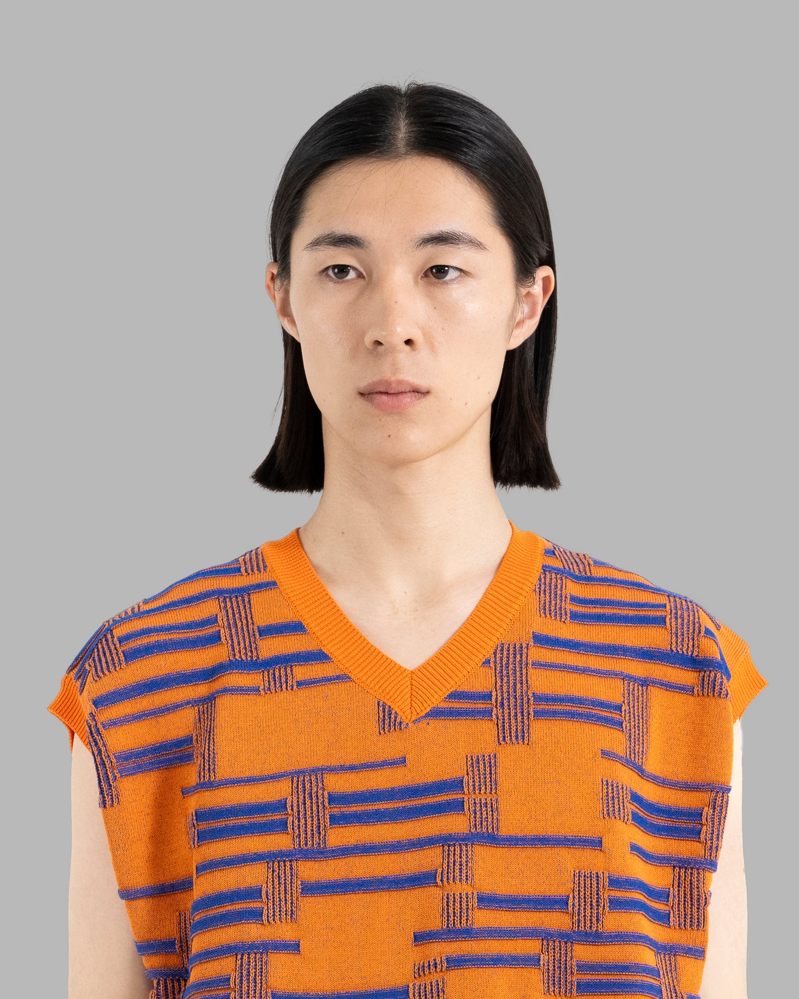 DEFORMATION BORDER KNIT VEST -ORANGE/BLUE